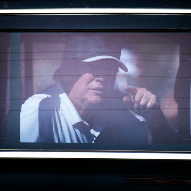 west palm beach, florida   february 15 former president donald trump reacts as he is driven past supporters on february 15, 2021 in west palm beach, florida the rally participants lined the street on president's day to show support for him after his 2020 election loss to president joe biden photo by joe raedlegetty images