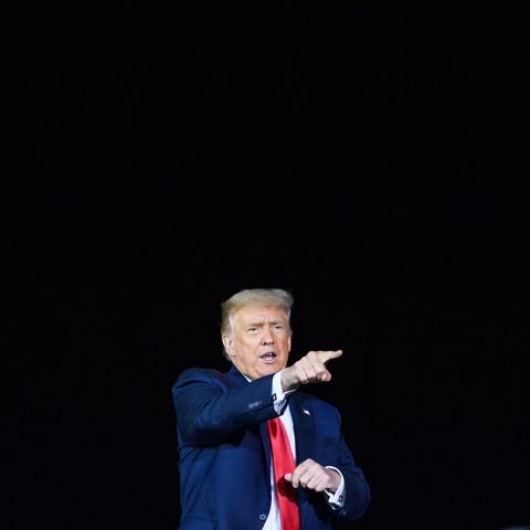 us president donald trump gestures at supporters during a campaign rally at mbs international airport in freeland, michigan on september 10, 2020 photo by mandel ngan  afp photo by mandel nganafp via getty images
