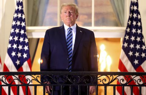 washington, dc   october 05 us president donald trump stands on the truman balcony after returning to the white house from walter reed national military medical center on october 05, 2020 in washington, dc trump spent three days hospitalized for coronavirus photo by win mcnameegetty images