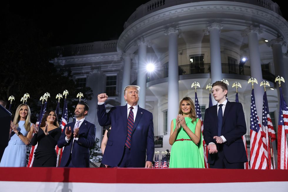 washington, dc   august 27 us president donald trump c reacts as he stands with his family members after delivering his acceptance speech for the republican presidential nomination on the south lawn of the white house august 27, 2020 in washington, dc trump gave the speech in front of 1500 invited guests  photo by chip somodevillagetty images