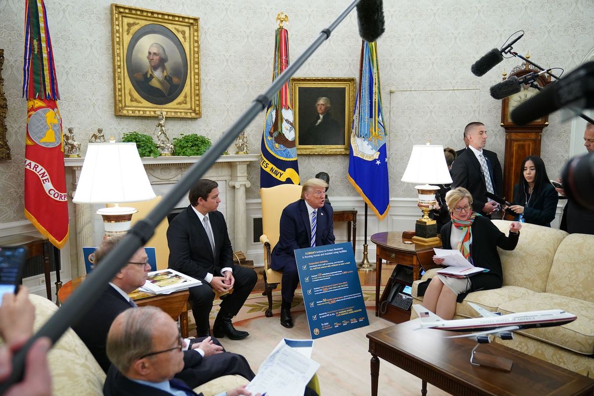 response coordinator for white house coronavirus task force deborah birxr speaks as us president donald trump meets with florida governor ron desantisc in the oval office of the white house in washington, dc on april 28, 2020 photo by mandel ngan  afp photo by mandel nganafp via getty images