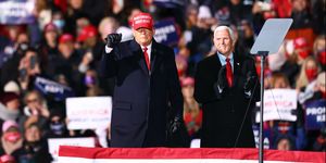 traverse city, mi   november 02 us president donald trump l and us vice president mike pence r greet supporters at a rally on november 2, 2020 in traverse city, michigan president trump and former vice president democratic presidential nominee joe biden are making multiple stops in swing states ahead of the general election on november 3rd photo by rey del riogetty images