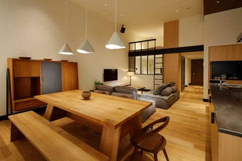 Room, Furniture, Interior design, Property, Living room, Wood flooring, Building, Table, Hardwood, Dining room, 