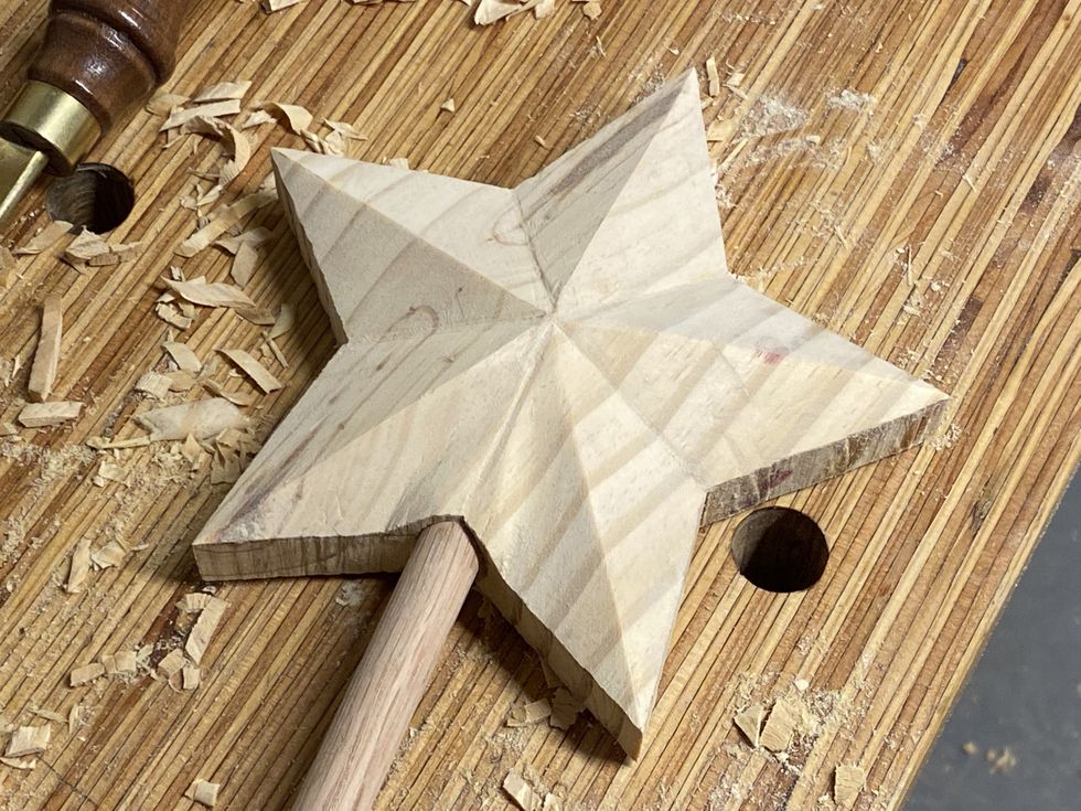 first side of the star carved