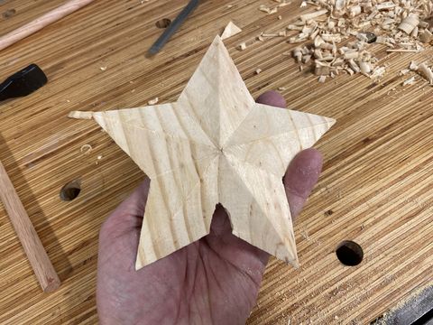 The wooden star carving is complete