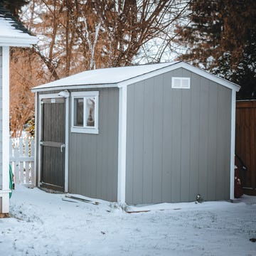 outdoor storage shed a grey outdoor tuff shed storage shed in a snowy backyard