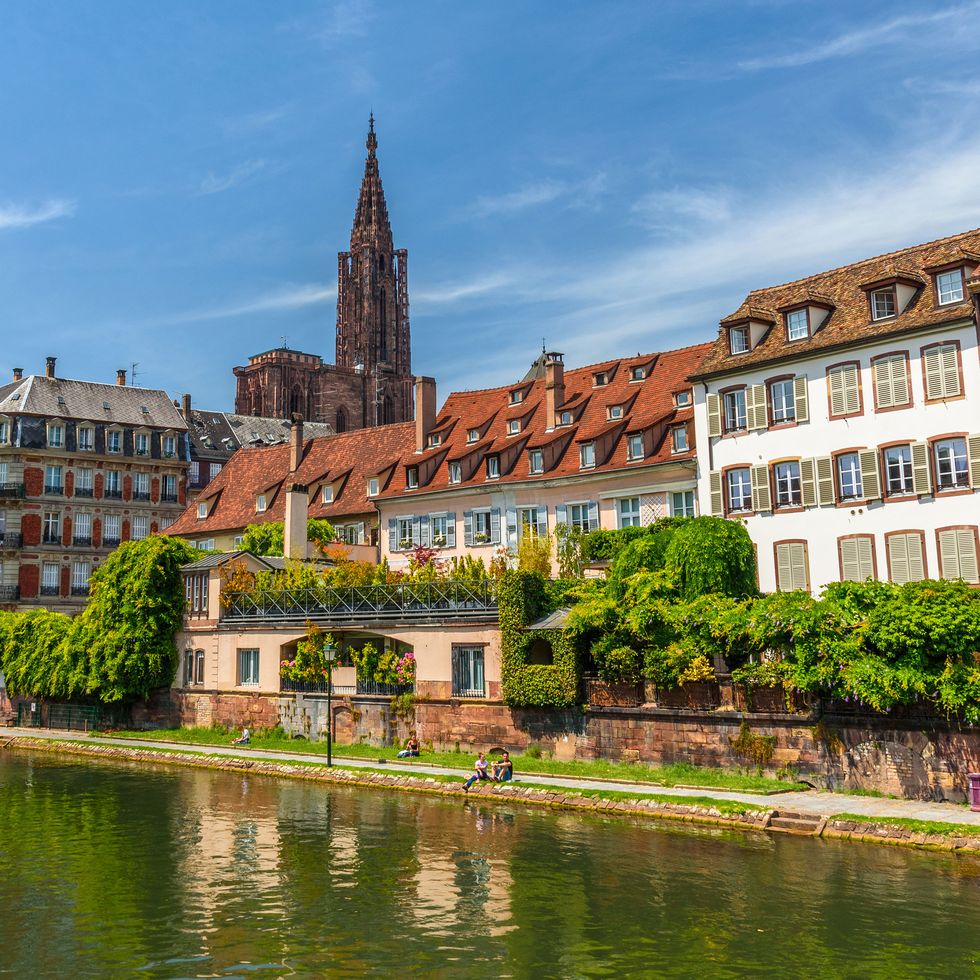 quaint houses along the riverbank in strasbourg