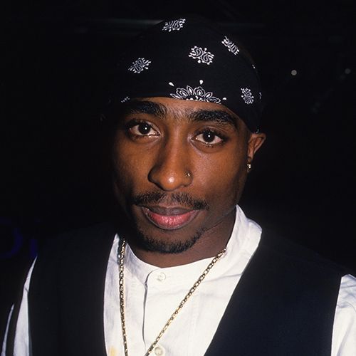 tupac shakur in a white shirt and black vest, with a black bandana on his head