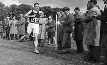 competitor in a race crossing the finish line