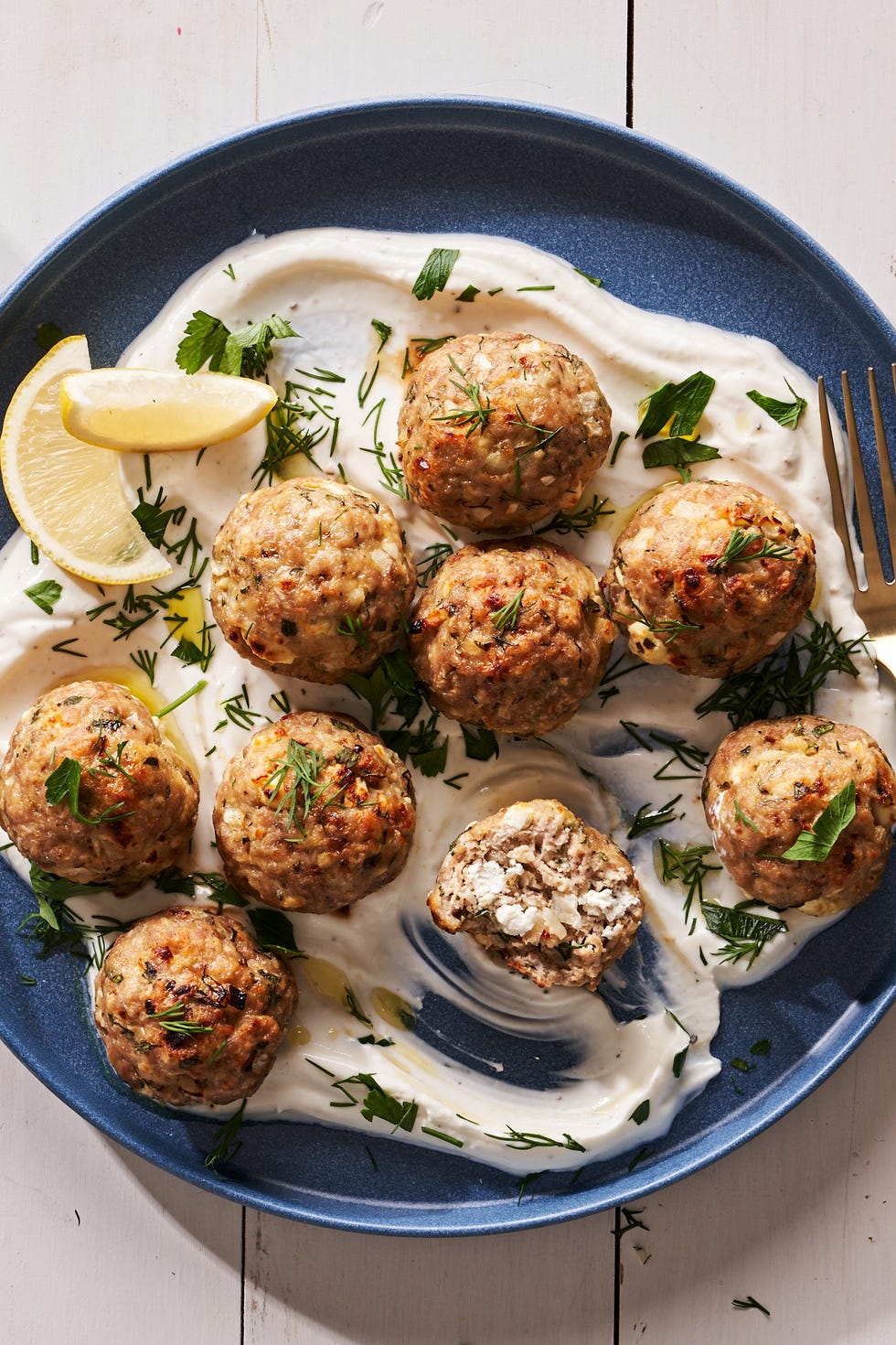 turkey feta meatballs  over a lemon yogurt sauce