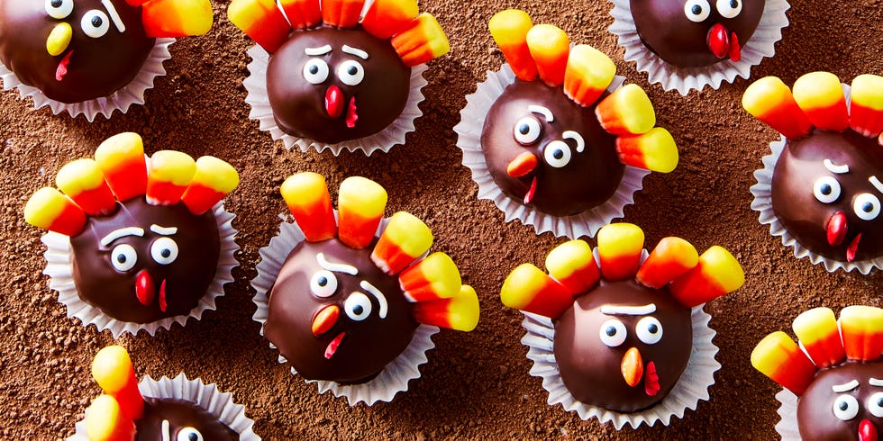 oreo balls decorated with candy to look like mini turkeys