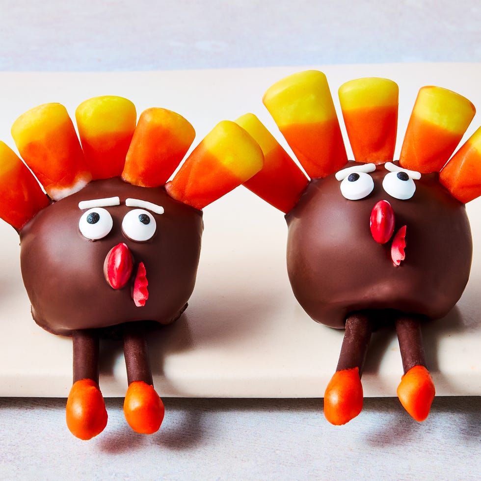 oreo balls decorated with candy to look like mini turkeys