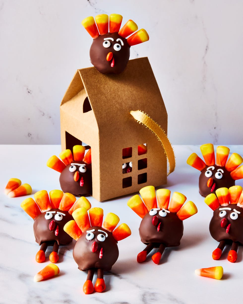 oreo balls decorated with candy to look like mini turkeys