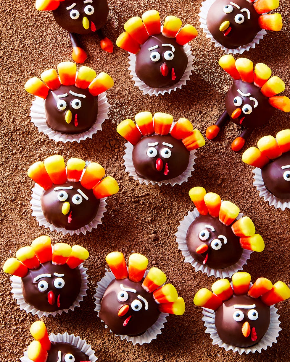 oreo balls decorated with candy to look like mini turkeys