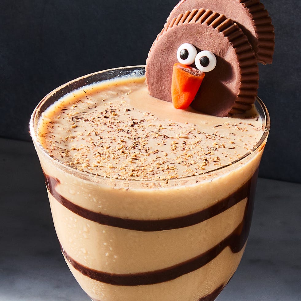 creamy cocktail topped with a turkey shaped like a reese's cup