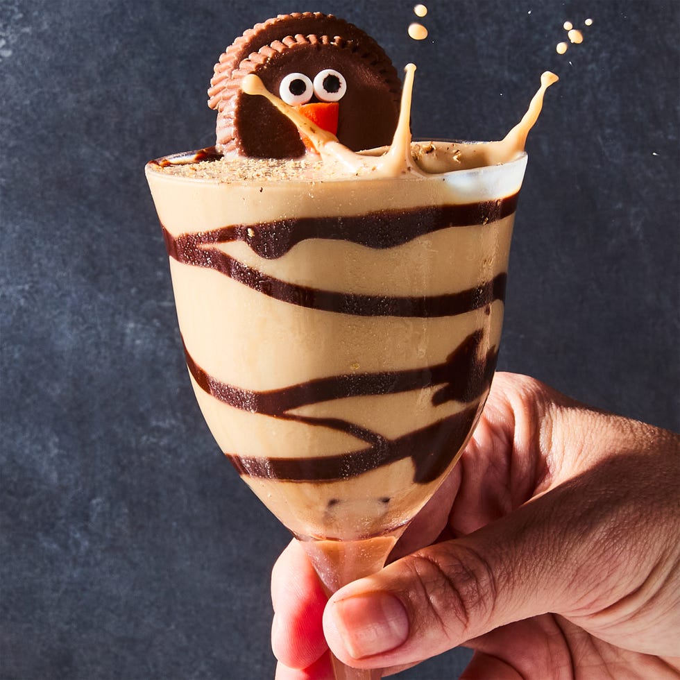 creamy cocktail topped with a turkey shaped like a reese's cup