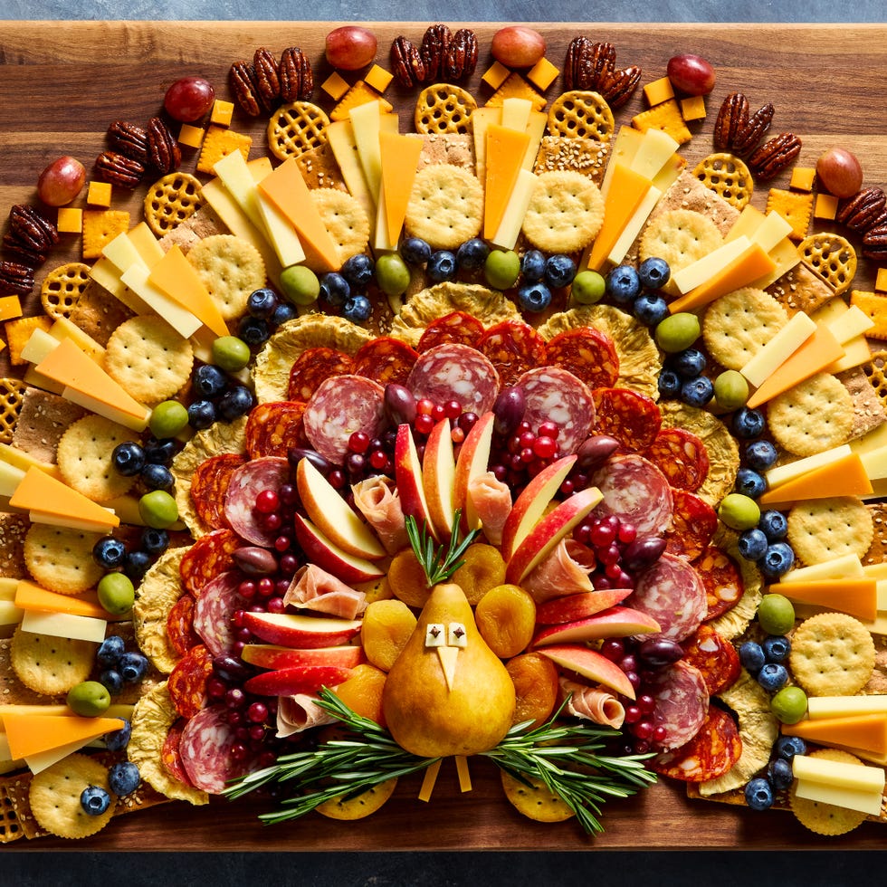 charcuterie board shaped like a turkey