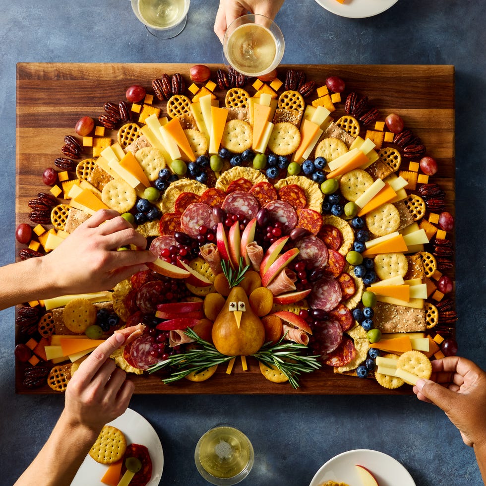 charcuterie board shaped like a turkey