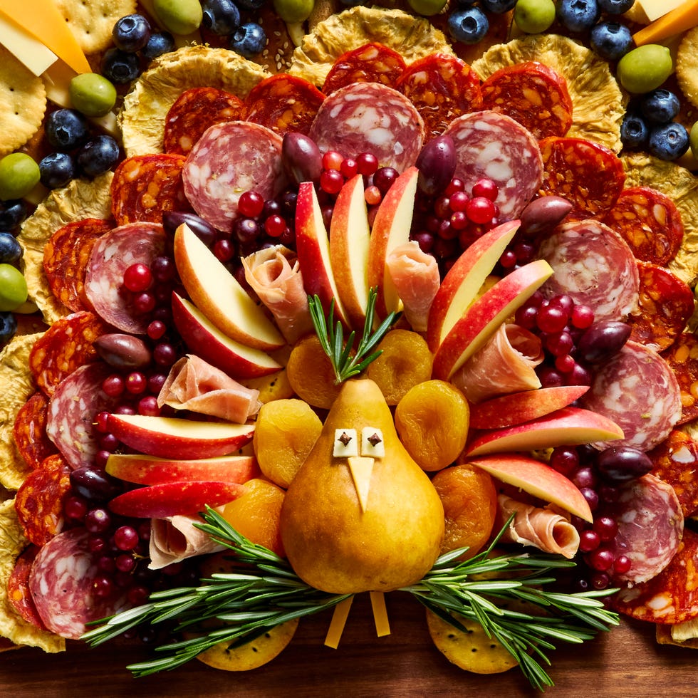 charcuterie board shaped like a turkey
