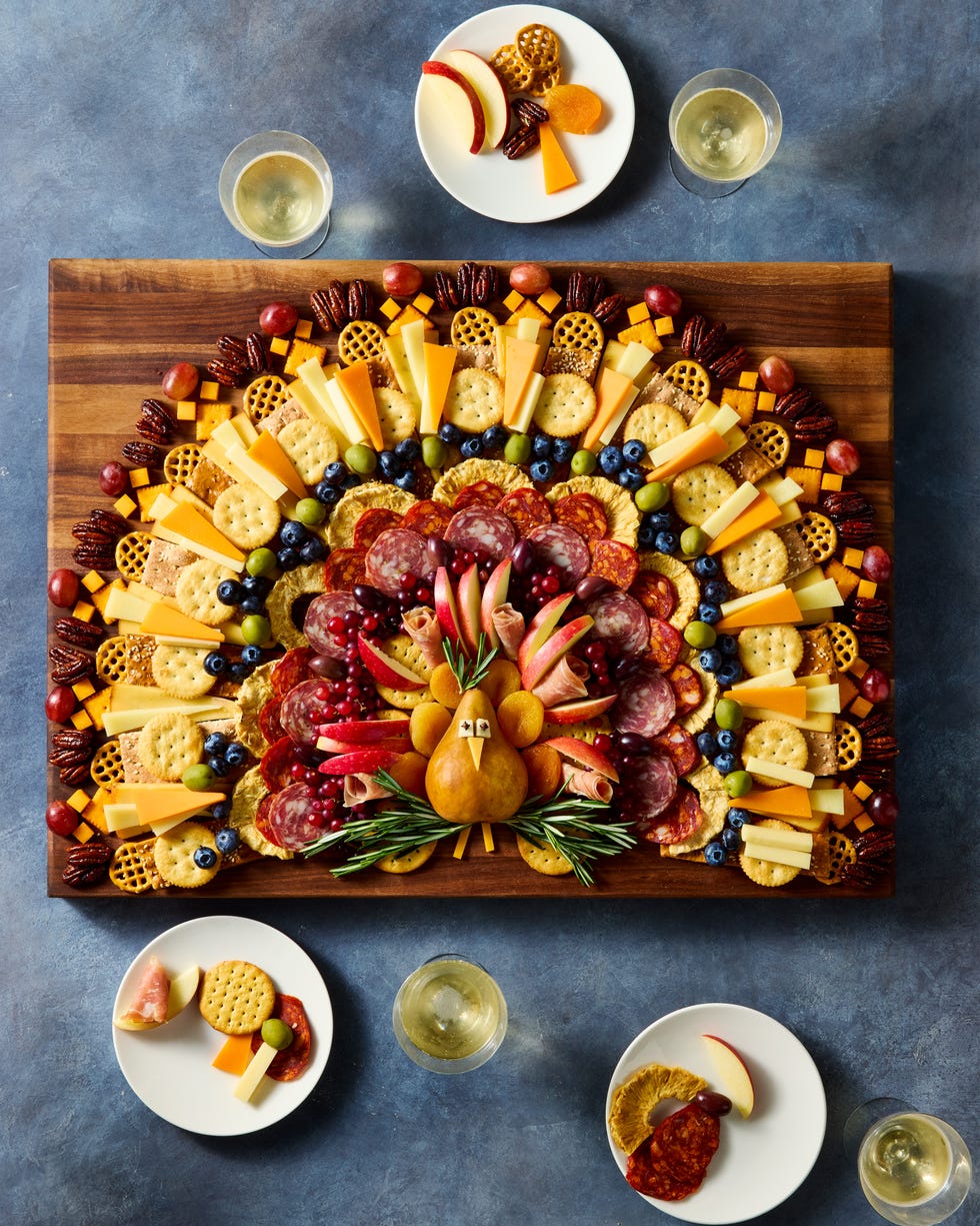 charcuterie board shaped like a turkey