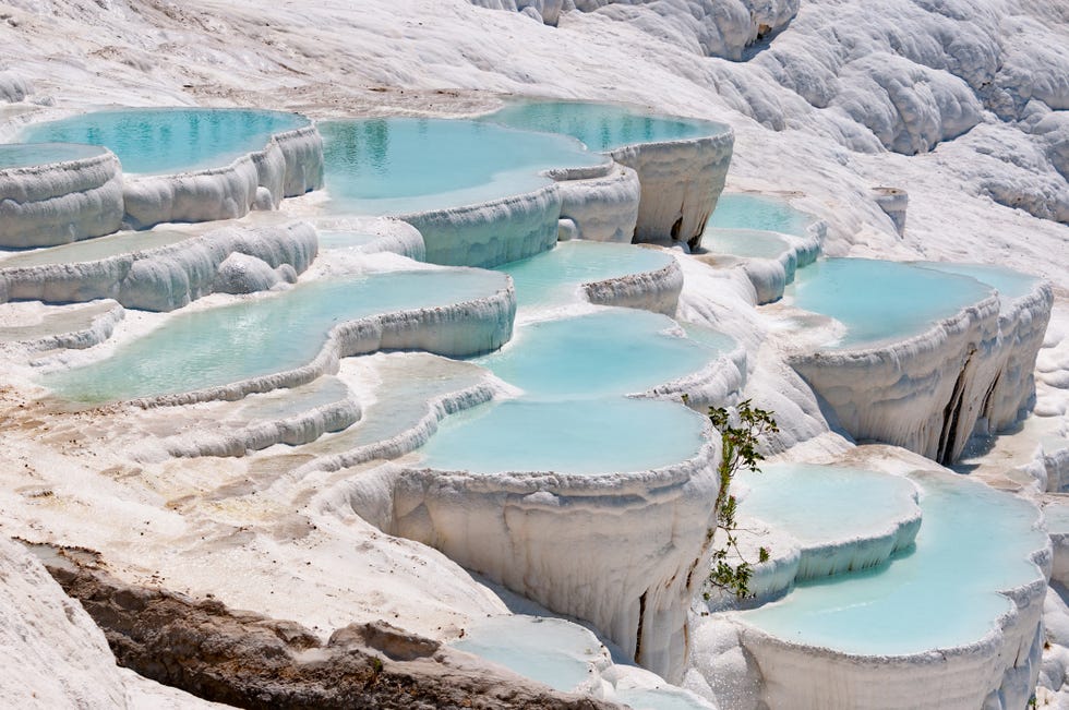 Turquoise pools in travertine terraces at Pamukkale, Turkey turquoise pools in travertine terraces at pamukkale, turkey