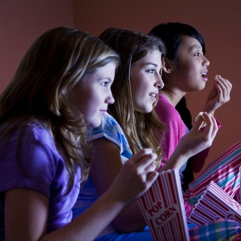 tween girls watching tv