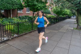 woman running down the street