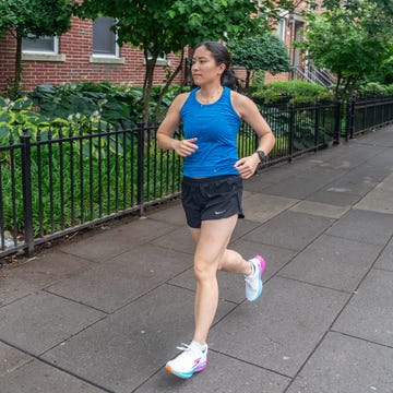 woman running down the street woman running down the street
