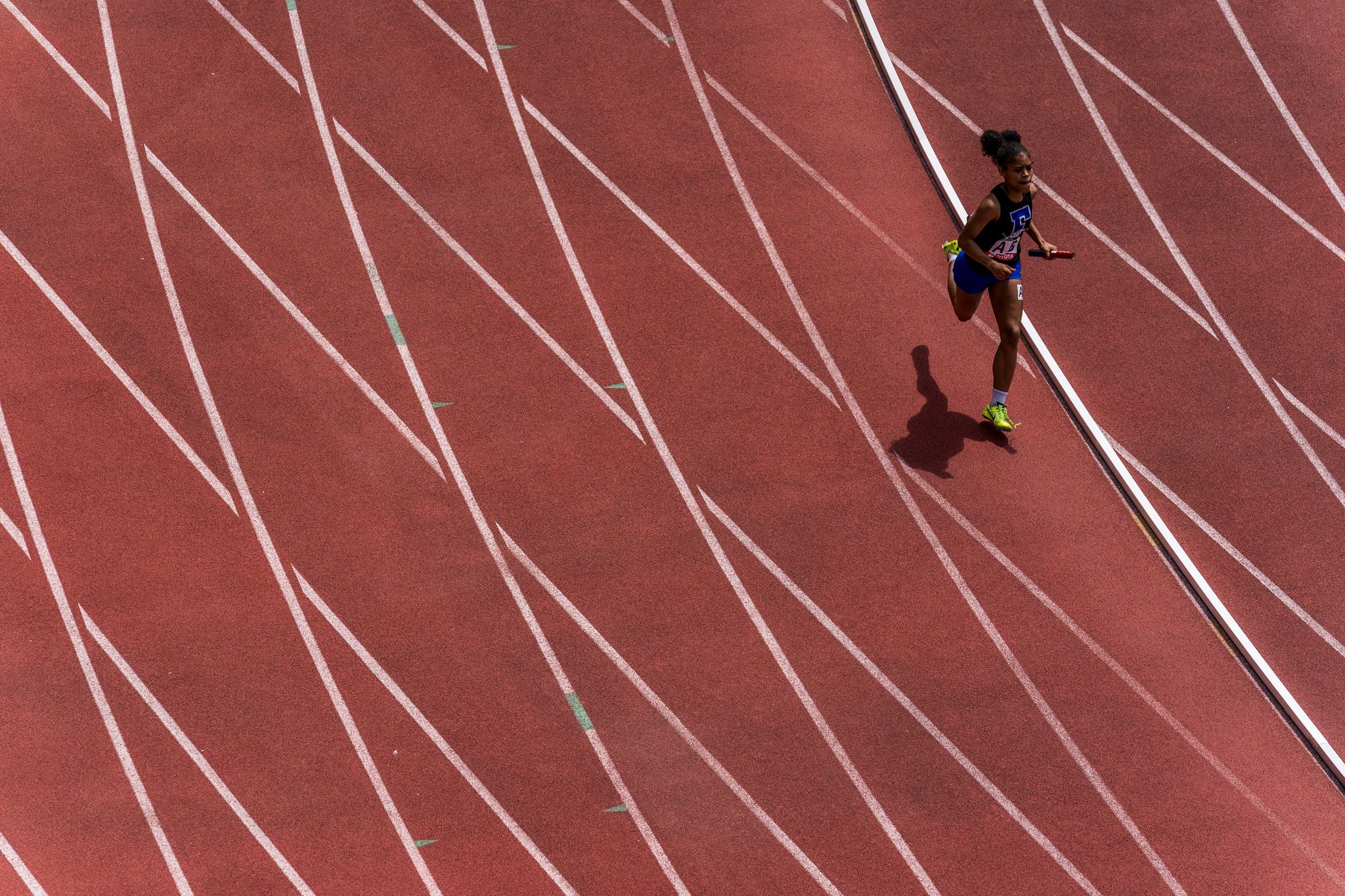 RWD an overhead view of a single runner on a track