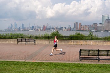 woman running near the waterfront
