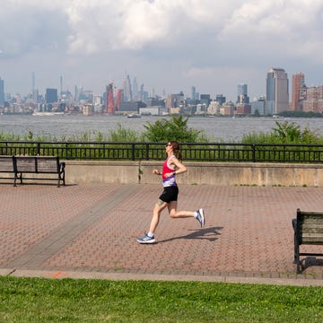 woman running near the waterfront woman running near the waterfront