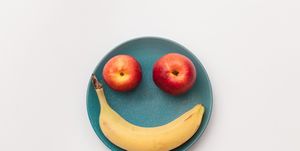 two apples and a banana create abstract smile,russia