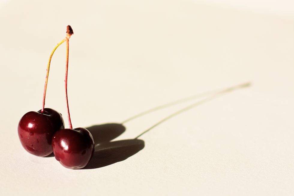 Two Cherries and Their Shadow