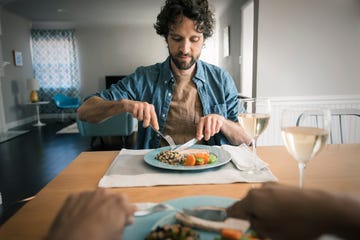 two friends have a meal from a personal perspectiv