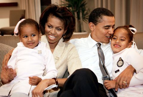 chicago   november 2 candidate for the us senate barack obama d il sits with his wife michelle and daughters sasha l and malia r in a hotel room as they wait for election returns to come in november 2, 2004 in chicago, illinois obama is expected to win easily against the republican candidate alan keyes photo by scott olsongetty images