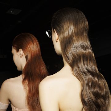 milan, italy february 24 models, hair detail, are seen backstage ahead of the ermanno scervino fashion show during the milan fashion week womenswear fallwinter 2024 2025 on february 24, 2024 in milan, italy photo by rosdiana ciaravologetty images