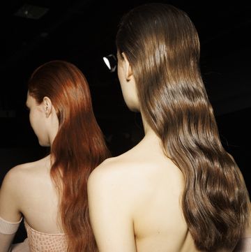 milan, italy february 24 models, hair detail, are seen backstage ahead of the ermanno scervino fashion show during the milan fashion week womenswear fallwinter 2024 2025 on february 24, 2024 in milan, italy photo by rosdiana ciaravologetty images