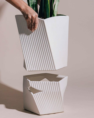 The Carmen planter can keep plants alive for three weeks!