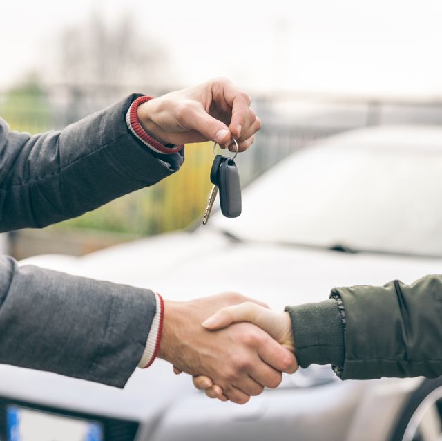 https://hips.hearstapps.com/hmg-prod/images/two-people-reaching-an-agreement-about-a-car-sale-royalty-free-image-1665671206.jpg?crop=0.682xw:1.00xh;0.160xw,0&resize=640:*