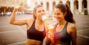 two sporty women eating ice cream