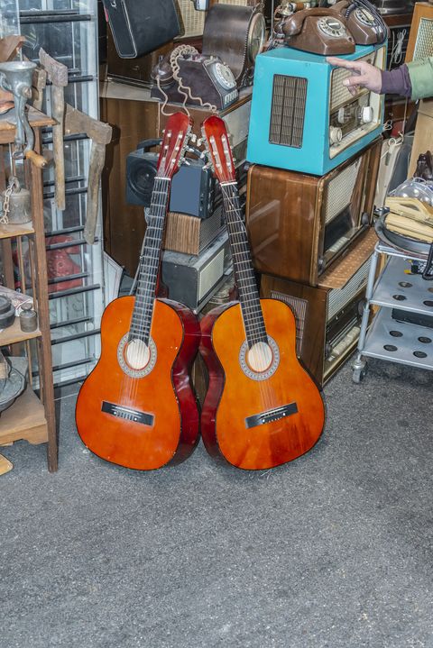 two used classical guitars offered for sale at the bazaar
