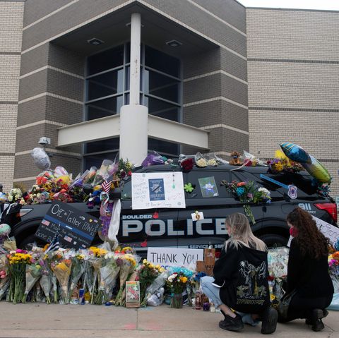 officer eric talleys police car with balloons and flowers