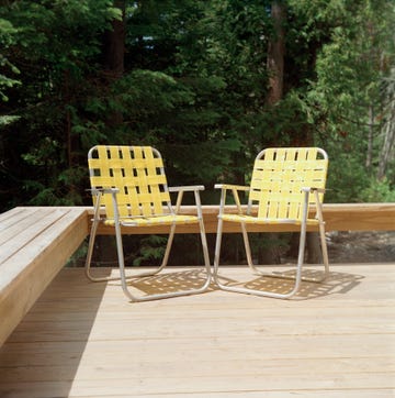 two yellow folding chairs