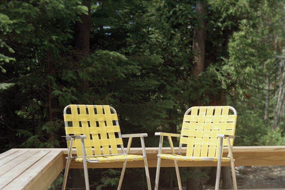 two yellow folding chairs