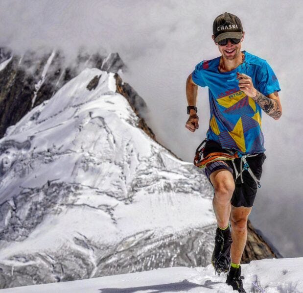 a runner navigating a snowcovered mountainous terrain