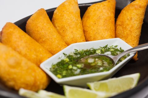 Typical Colombian empanadas served with spicy sauce