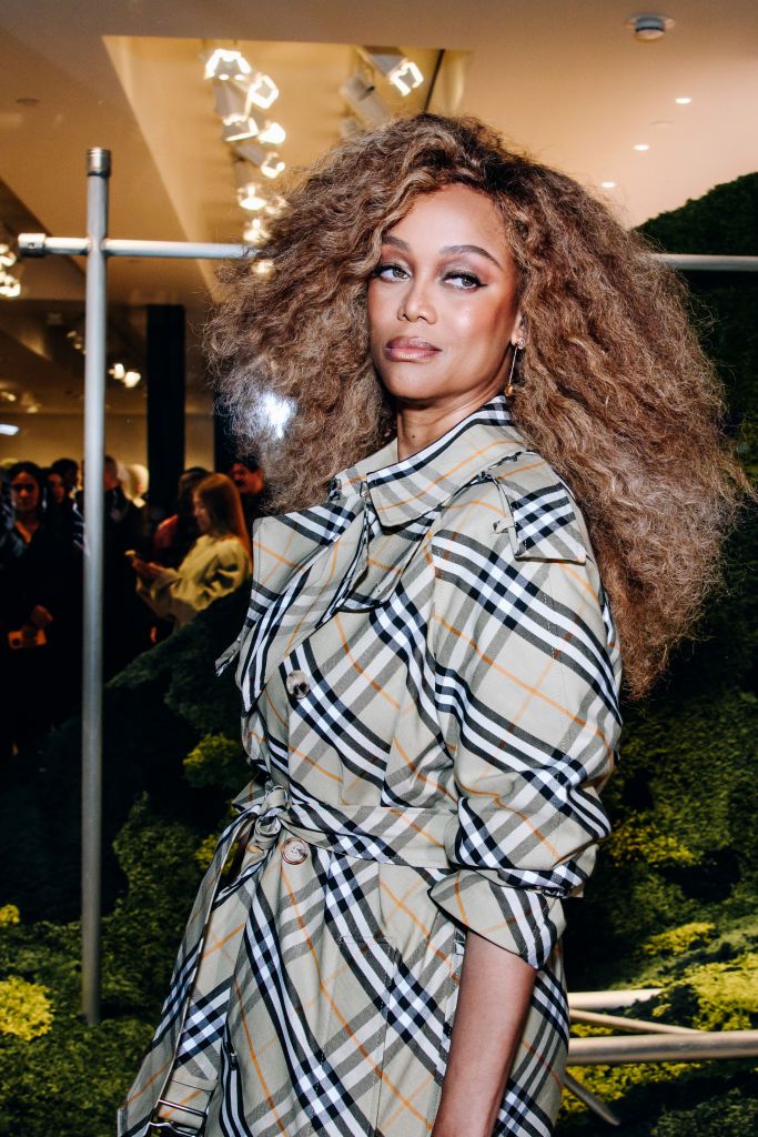 Tyra Banks Wears Trench Covered in Burberry's Signature Check