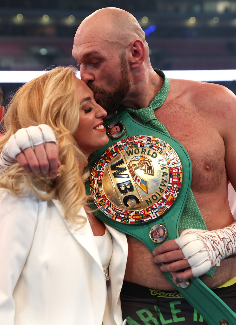 tyson fury celebrates victory with his wife paris fury after the wbc world heavyweight title fight in 2022