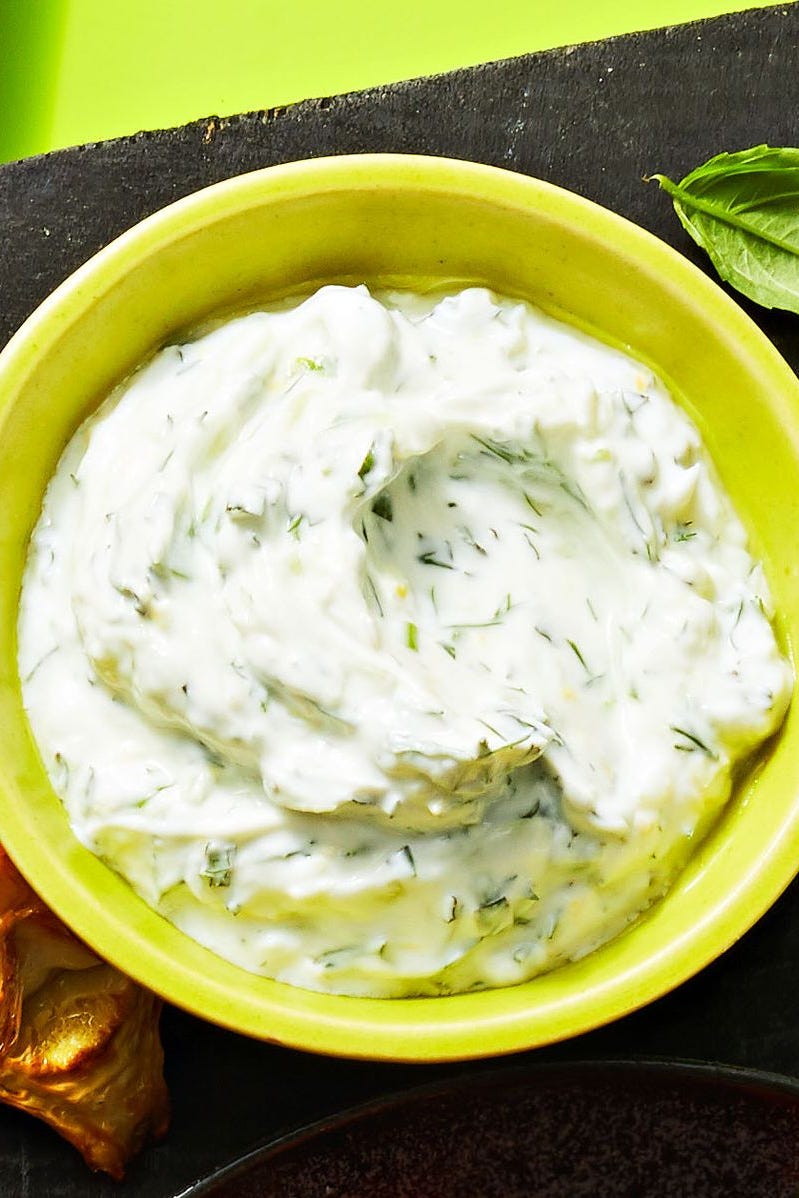 tzatziki dip in a green bowl