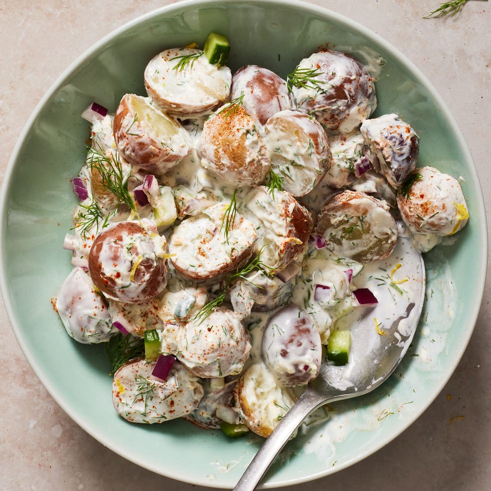 tzatziki potato salad in a light teal bowl